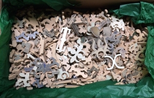 Box of wooden pieces